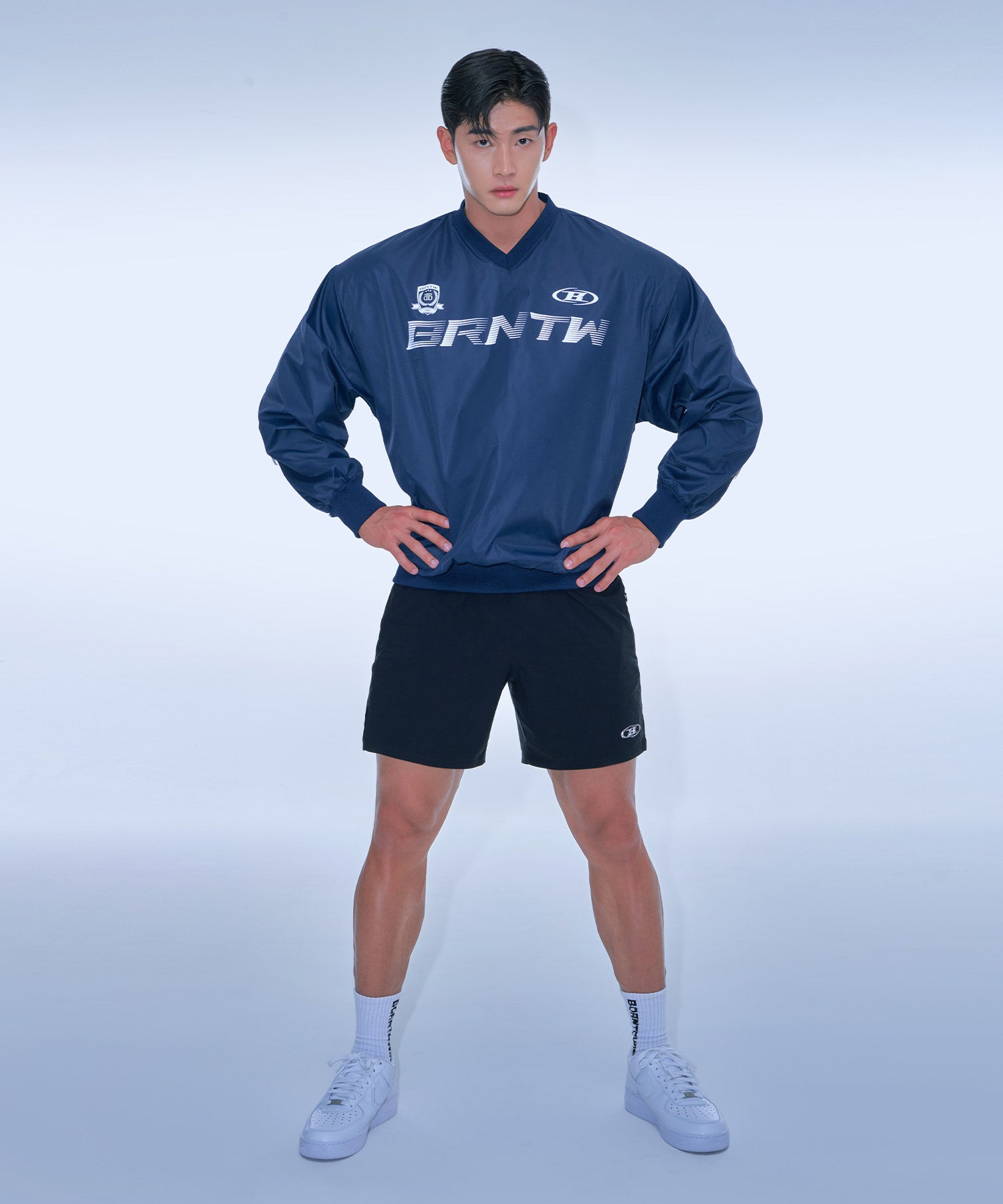 BRNTW WIND TECH WOVEN TOP [NAVY]