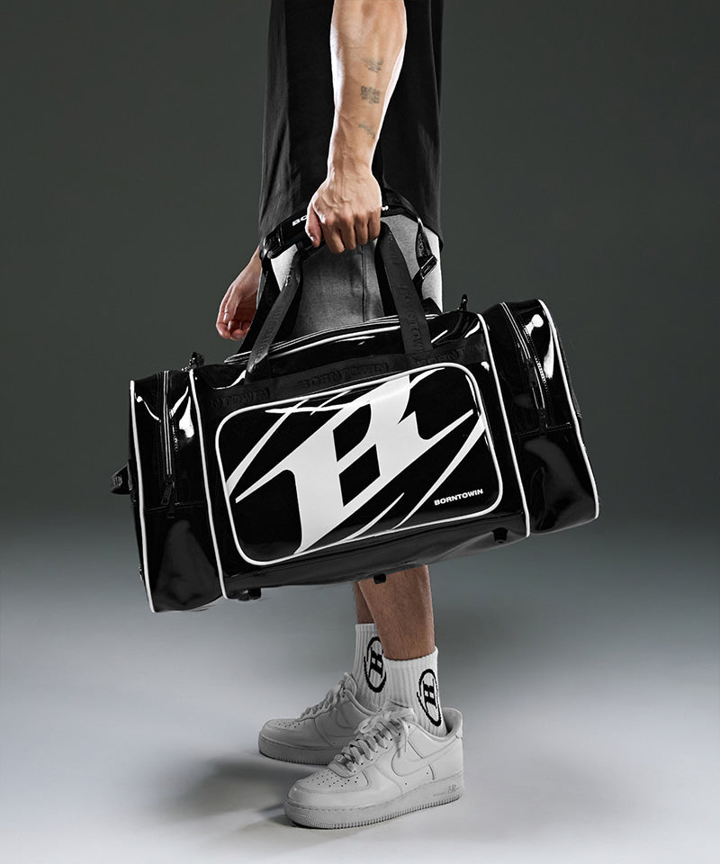 【韓国限定】SYMBOL LOGO ENAMEL DUFFLE BAG [BLACK]